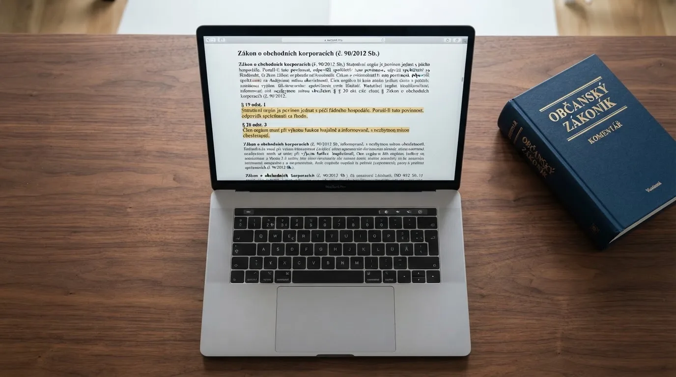 Otevřená kniha zákona o hazardních hrách s vyznačenými paragrafy § 34 a § 35 na obrazovce notebooku